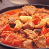 Red Curry Lamb · Chunk lamb with mixed vegetables and malaysian spices in red curry sauce