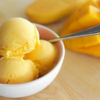 Mango Ice Cream · Ice cream made with condensed milk and mango chunks