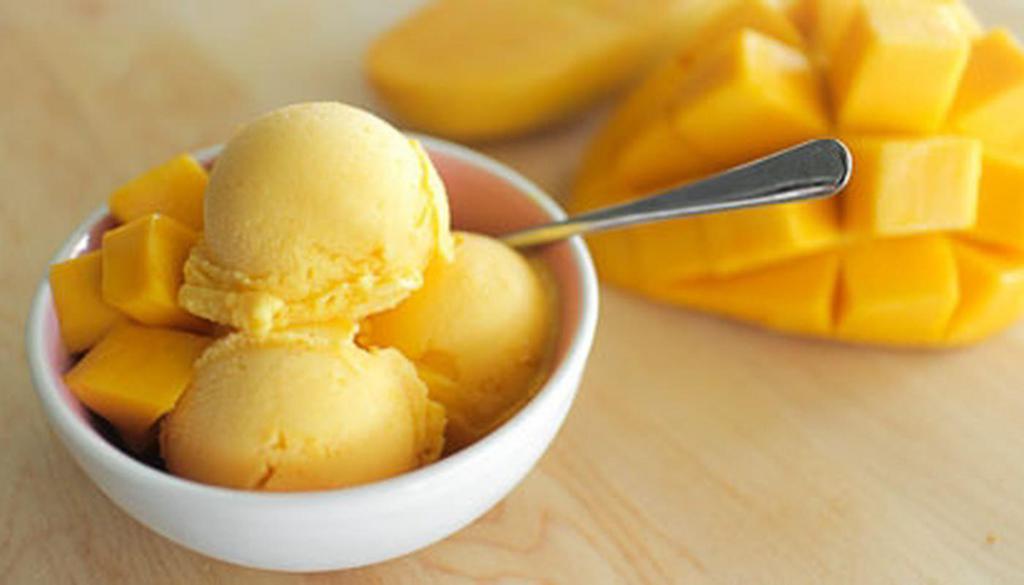 Mango Ice Cream · Ice cream made with condensed milk and mango chunks