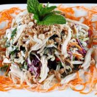 K4 GOI GA| CHICKEN SALAD · cabbage, mint, carrot and chicken breast topped with fried shallot, crushed peanuts, and nươ...