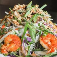 K9 GOI HAI SAN| SEAFOOD SALAD · flame grilled calamari+shrimp, tossed cabbage+basil, topped with fried shallot, crushed pean...