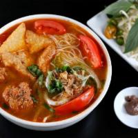 M2 BUN RIEU · originated in northern vietnam: rice flour vermicelli, minced pork+shrimp, tofu, tomato in a...