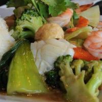 X5  THAP CAM XAO |  COMBINATION STIR FRY (*) · wok tossed beef, chicken, shrimp, broccoli, cabbage, bok choy, and carrots in house special ...