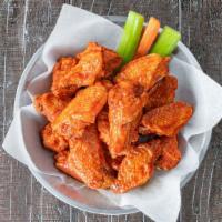 Bone-In Wings - Large (16) · A hefty amount of 16 of our world famous fresh, never frozen Buffalo’s chicken wings and dru...