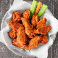 Bone-In Wings - Medium (10) · A portion of ten of our world famous fresh, never frozen Buffalo’s chicken wings and drumett...