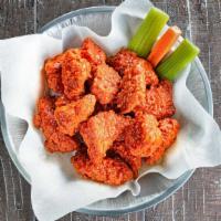 Boneless Wings - Large (16) · Traditional Boneless Chicken Wings with your choice of sauce. Served with celery, carrots an...