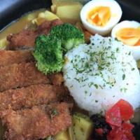 Katsu- curry rice  · Japanese style curry with chicken-katsu  bread cutlet comes rice , boiled egg and pickles.