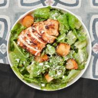 Chicken Caesar Salad  · Romaine lettuce, grilled chicken, house croutons, and parmesan cheese tossed with caesar dre...
