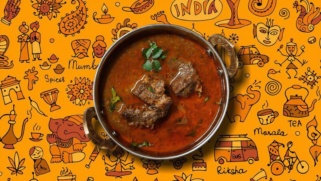 Railway Goat Curry · Succulent goat meat slow cooked in a classic brown curry, served with a side of our aromatic basmati rice