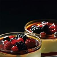 Creme Brulee e Frutti di Bosco · A layer of raspberry sauce topped with a 
creamy custard and decorated with mixed 
berries c...