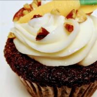 Yum Carrot Cake · Moist carrot cake topped with luscious cream cheese frosting . Depending on availability the...
