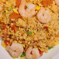Cajun Shrimp Fried Rice · Shrimp with Jasmine rice, sweet corn and diced Louisiana Hot Links stir fried in House Cajun...