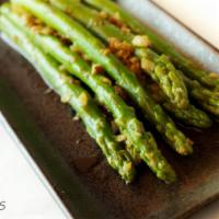 Asparagus · Sauteed with garlic and extra virgin press olive oil.