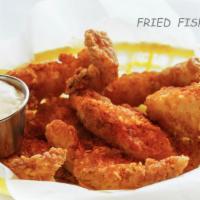 Fried Fish Strip · Swai Fillet Breaded and fried tossed in spices served with tartar sauce