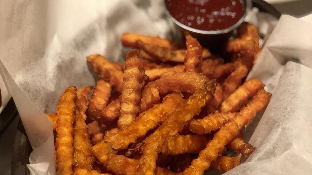 Sweet Potato Fries · Crispy crinkle yam fries.