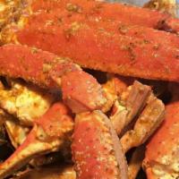 Snow Crab Legs · Simmer in our house Cajun, garlic butter, lemon pepper and fresh basil sauce.