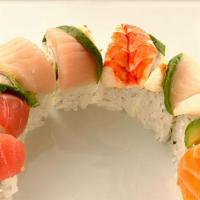 Rainbow Roll · Out: tuna, ebi, sake, hamachi, & avocado; in: crab & avocado.
