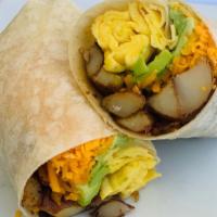 Veggie Breakfast Burrito · 2 scrambled eggs, melty cheddar, home fries, avocado, onion marmalade.
