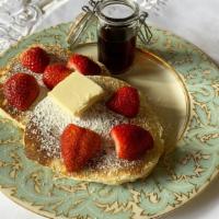 Buttermilk Pancakes with Strawberries · Two pieces. Butter and sugar.