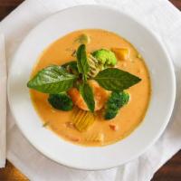 55. Pumpkin Curry · In red curry coconut milk with pumpkin, bell pepper and sweet basil.