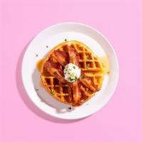 Maple Bacon Waffle · A fluffy Belgian waffed topped with crispy bacon and maple syrup.