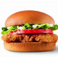 Crispy Chicken Sandwich · Juicy all-white fried chicken breast topped with crisp lettuce, ripe tomatoes, and salad dre...