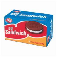 Dq® Sandwich · Cold, creamy DQ® vanilla soft serve, nestled between two chocolate flavored wafers.