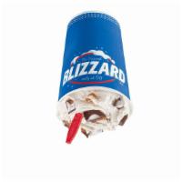 Reese'S Peanut Butter Cup Blizzard Treat · REESE'S Peanut Butter Cups blended with creamy DQ vanilla soft serve to BLIZZARD perfection
