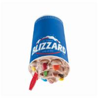 M&M Blizzard® · M&M's® candy pieces blended with chocolate sauce blended with creamy vanilla soft serve.