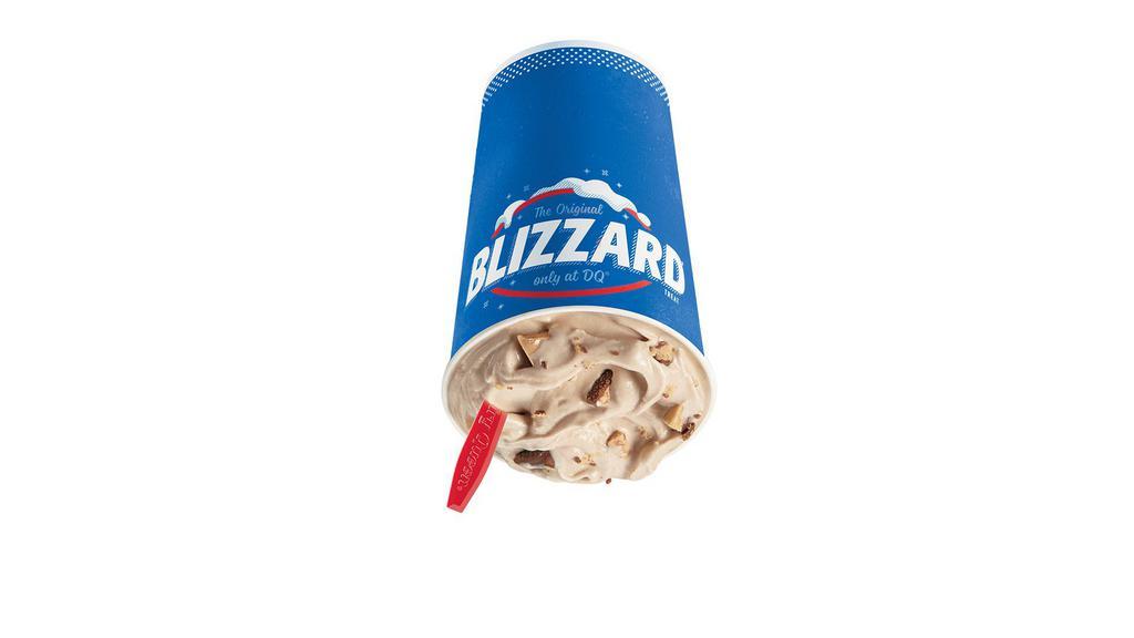 Heath® Blizzard® Treat · Heath® candy pieces blended with chocolate sauce and creamy vanilla soft serve.