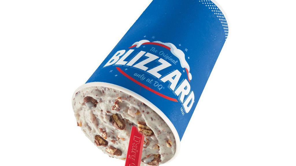 Nestle® Drumstick® With Peanuts Blizzard® Treat · Choco covered drumstick cone pieces and chopped peanuts blended with our world-famous vanilla soft serve to Blizzard® perfection.