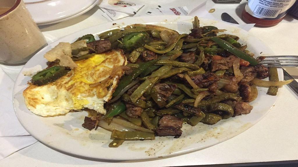Nopales (Cactus) · 3 Ranch eggs scrambled with Nopales, jalapeños, onions, bacon & tomato served with Golden hashbrowns, toast & jelly or tortilla.