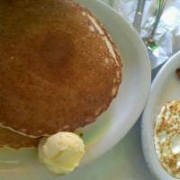 Pancake Sandwich · Including two Pancakes Choice of sausage or Bacon and One Ranch Egg. Served with butter and ...