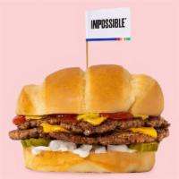 Impossible™️ Beast Style · Smashed crispy Impossible™ patties with house seasoning, American cheese, pickles, diced whi...