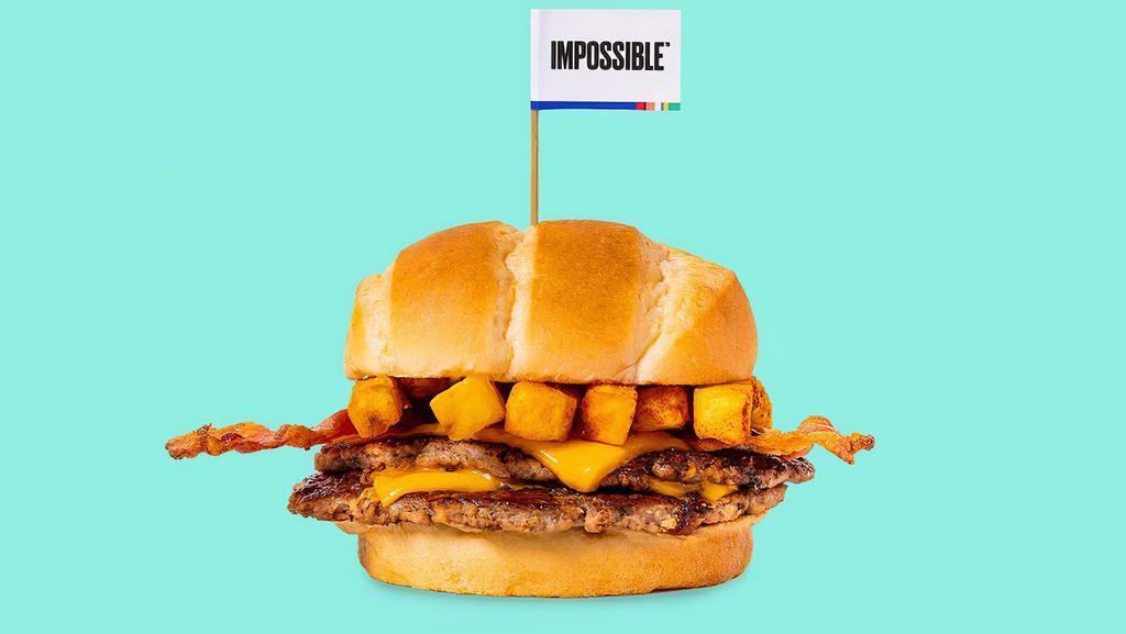 Impossible™️ Chris Style · Two smashed crispy Impossible™ patties with house seasoning, American cheese, bacon, topped with crinkle fries.