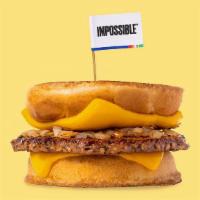 Impossible™️ Karl’S Deluxe · A patty melt served Karl’s Style with a crispy seasoned Impossible™ patty, caramelized onion...