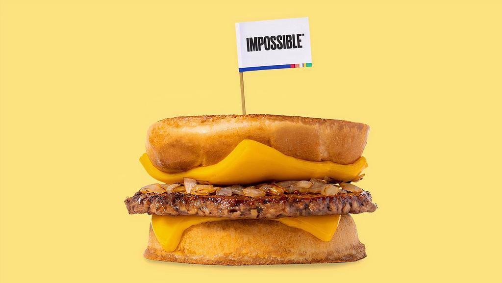 Impossible™️ Karl’S Deluxe · A patty melt served Karl’s Style with a crispy seasoned Impossible™ patty, caramelized onions and cheese on a toasty inverted bun.
