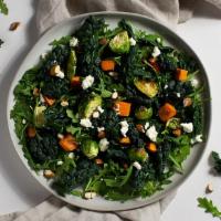 Brussel Sprout Sweet Potato Salad · Brussel Sprouts, sweet potatoes, kale, feta cheese, and almonds with your choice of greens a...