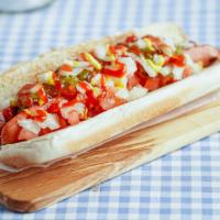 Hot Dog · 8 inch all beef grilled hot dog served on toasted hot dog bun. Served plain or with your cho...