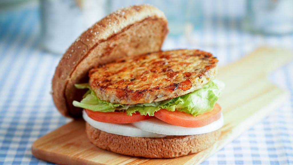 Harvester · A tasty meatless grain and veggie based patty served on a toasted whole wheat bun with tomatoes, lettuce, onions and dressing. (non vegan)