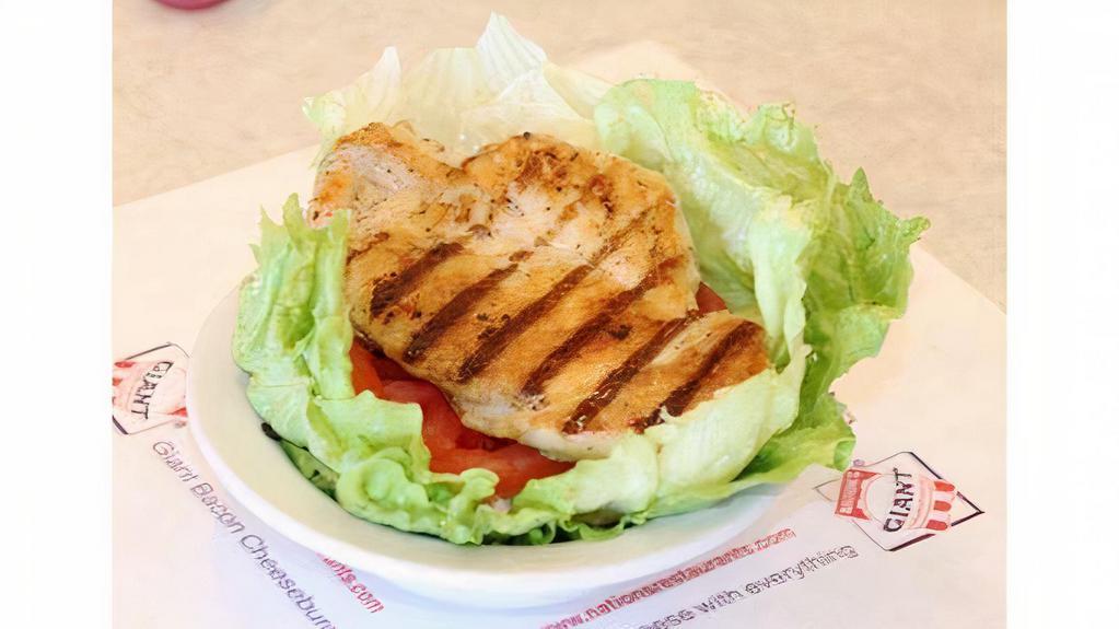 Lettuce Chicken Wrap · No bun. Grilled Chicken with tomatoes, onions and dressing. Served wrapped in lettuce.