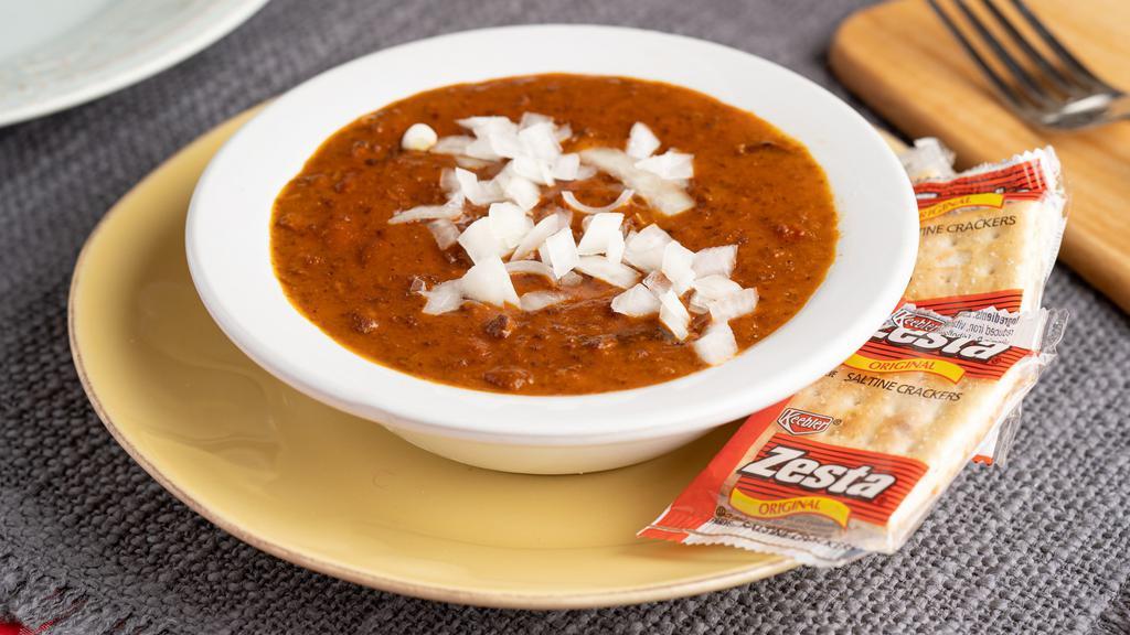 Bowl of Chili · A rich and meaty chili served with crackers.