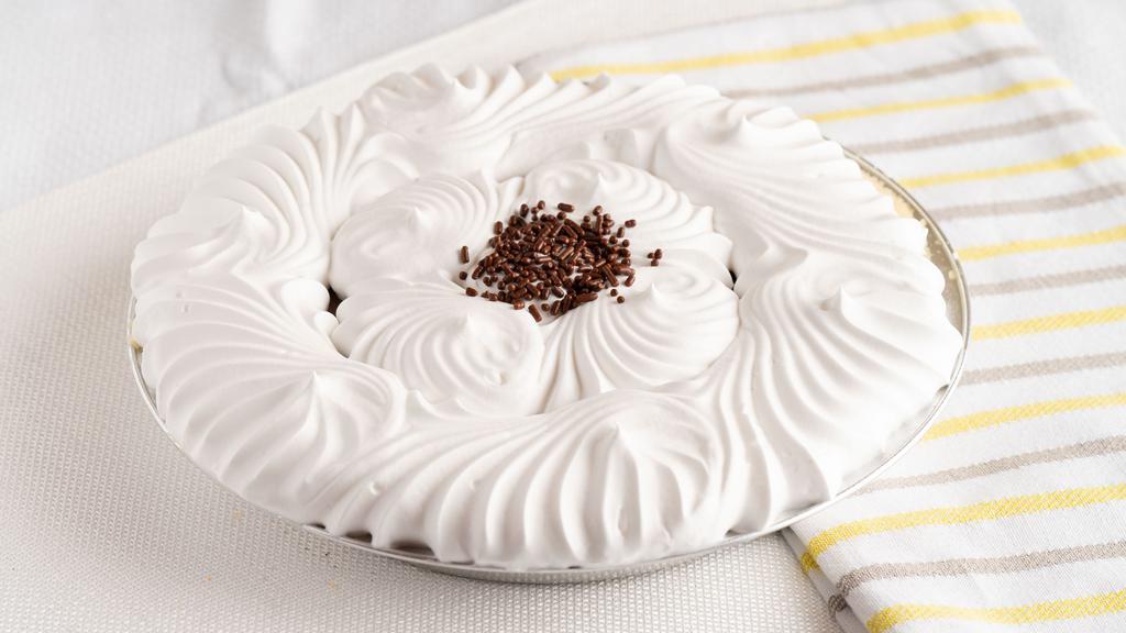 Chocolate Crème (Whole) · Guittard chocolate bars melted with cream inside a flakey pie crust. Topped with whipped topping.
