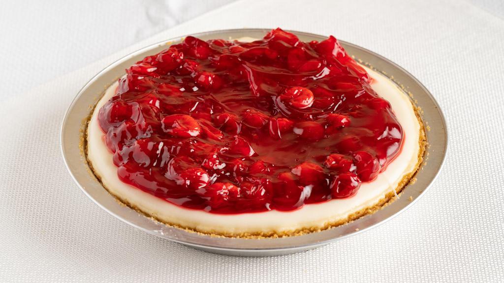 Cheesecake with Cherry Topping (Whole) · A cheesecake pie made with real Philadelphia cream cheese in hand pressed graham cracker crust, topped with glazed cherries.