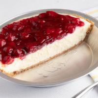 Cheesecake With Cherry Topping (Half) · A cheesecake pie made with real Philadelphia cream cheese in hand pressed graham cracker cru...
