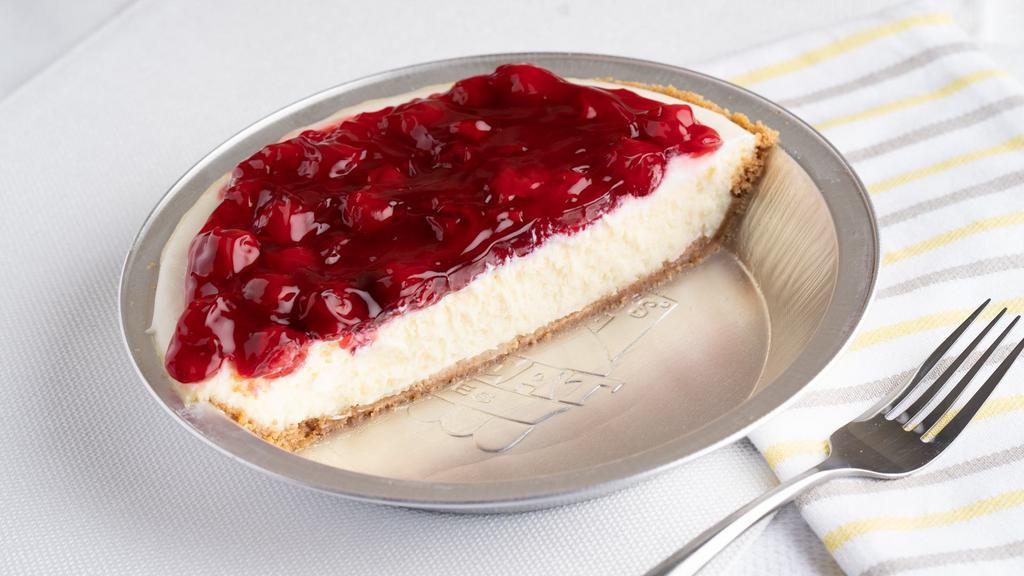 Cheesecake With Cherry Topping (Half) · A cheesecake pie made with real Philadelphia cream cheese in hand pressed graham cracker crust, topped with glazed cherries.