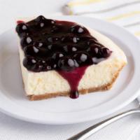 Cheesecake with Blueberry Topping (Slice) · A cheesecake pie   made with real Philadelphia cream cheese in hand pressed graham cracker c...