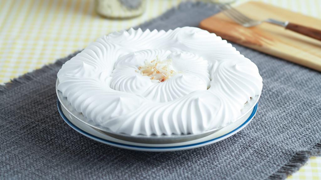Coconut Crème (Whole) · Refreshing coconut cream filling inside a flakey pie crust. Topped with whipped topping.