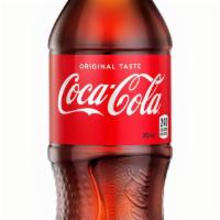 Coke Bottle · Delicious and refreshing, one-of-a-kind taste to complete your meal.