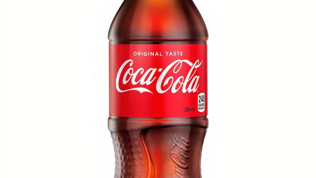 Coke Bottle · Delicious and refreshing, one-of-a-kind taste to complete your meal.